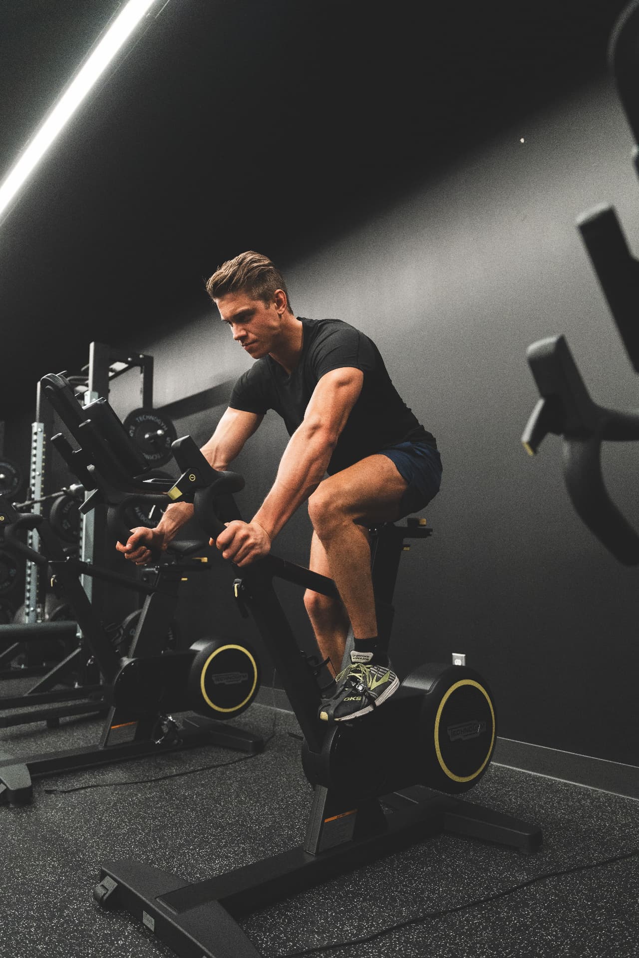 Man exercising on an indoor cycle